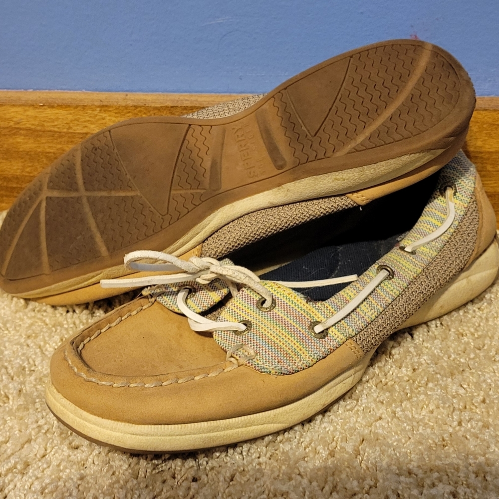 Sperry loafers.  Worn a lot but still have lots of life left. Dog friendly home.